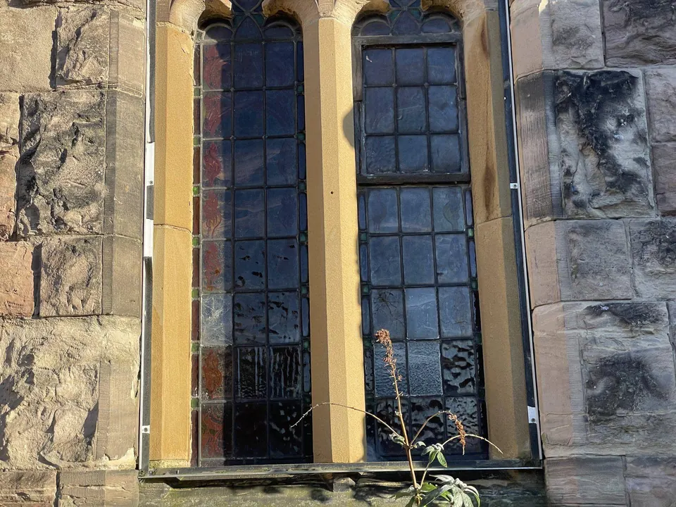 Tall lancet windows with yellow glazing